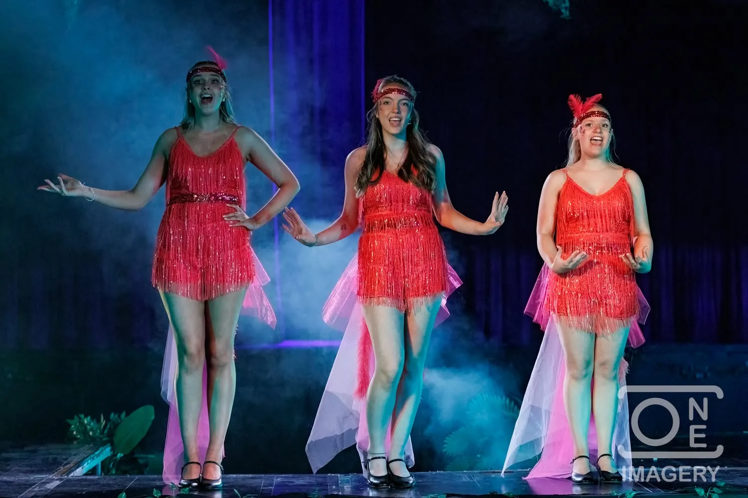 Three Bird Girls singing together in Seussical